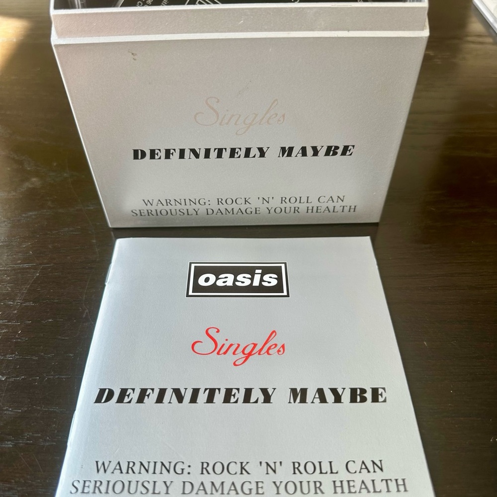 Oasis Singles Collection - Limited Edition 5 CD set in special box.